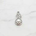 Intrigue Looking Sterling Silver Pendant With Cubic Zirconia Insets Rounding A Beautiful Freshwater Pearl - Terciany 