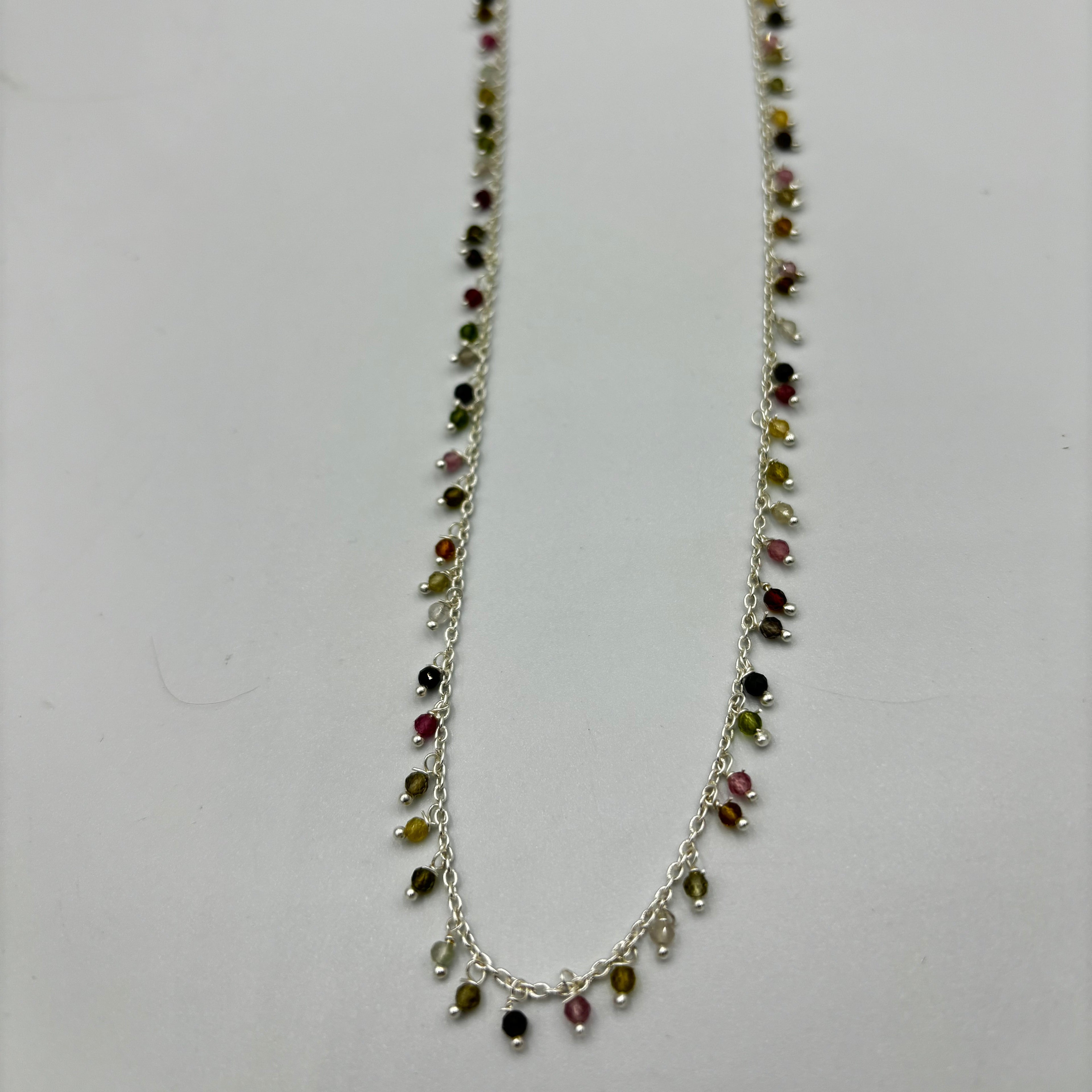 Sterling Silver Necklace With Lots Of Tourmaline Semi Precious Stones Dangling On It