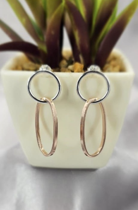 Sterling silver circle earrings with interlinked rose gold oval drop