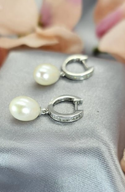 Perfect huggies with cubics in setting and beautiful 12mm freshwater pearls