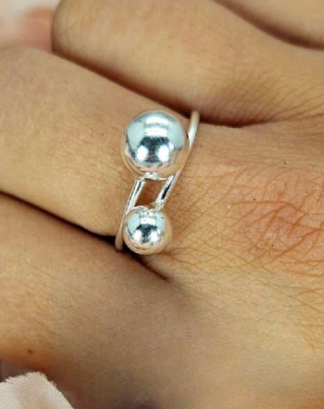 Cross over Sterling silver ball ring
