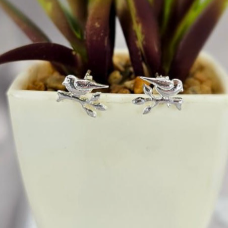 Bird on branch studs