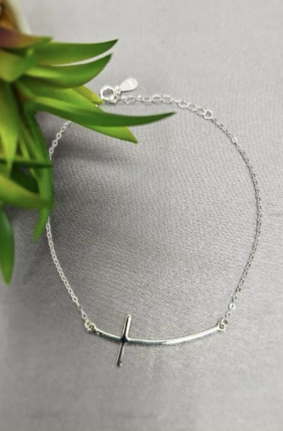 Sterling silver bracelet with shaped cross