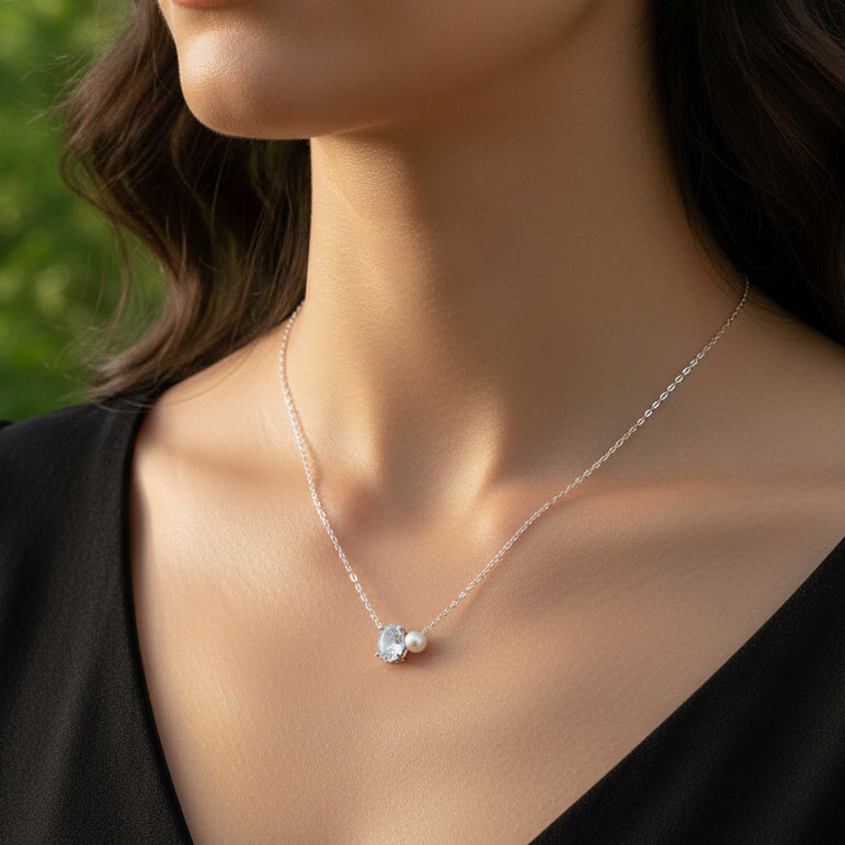 Necklace with a pendant on a textured fabric background