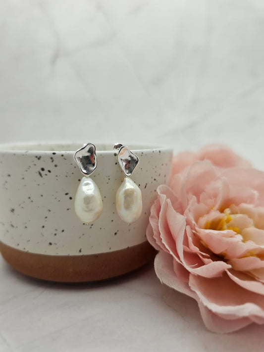 Stunning drop pearls with sterling silver setting