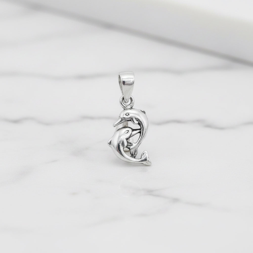 Sterling silver dolphin pendant