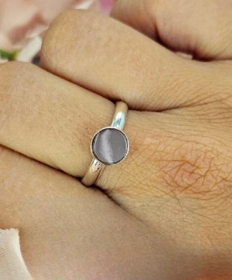 Sterling silver ring with silver round disc in top