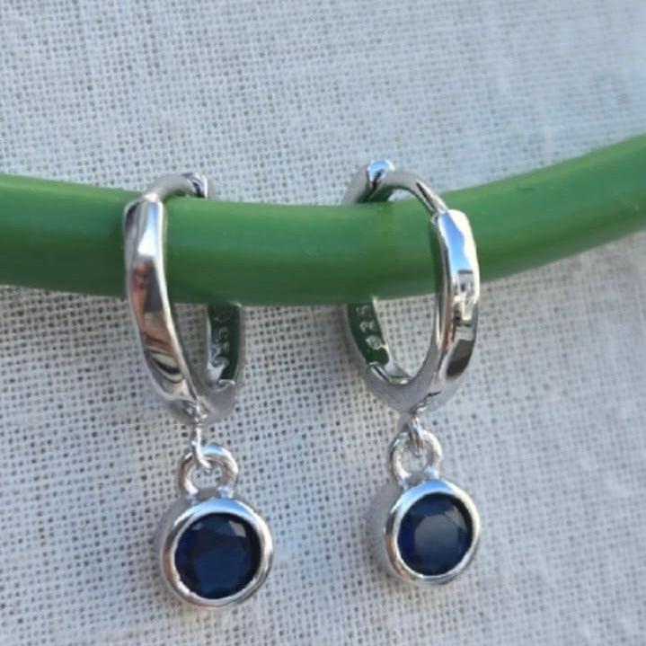 12mm Silver huggy earrings with blue drops