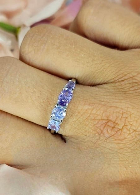 Sterling silver ring with different shades of purple cubic zirconia