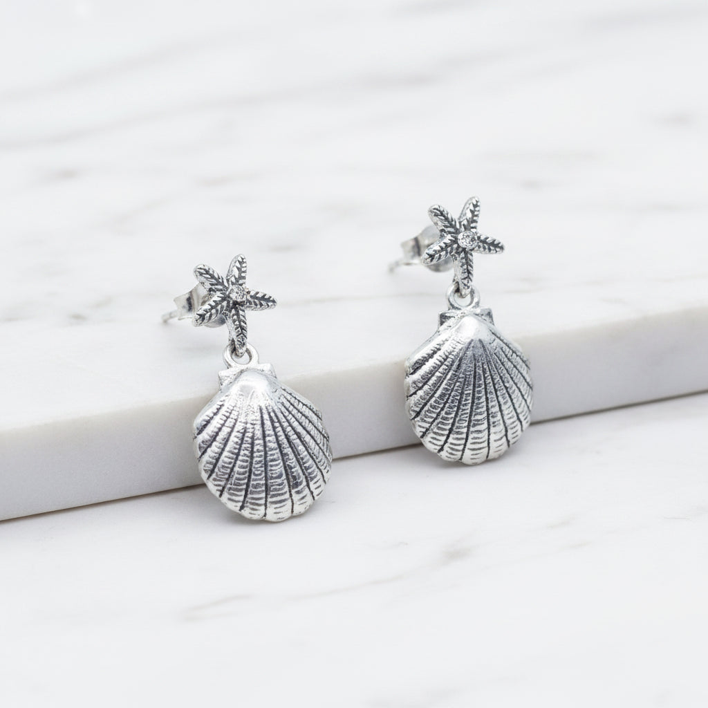 Star shell drop earrings