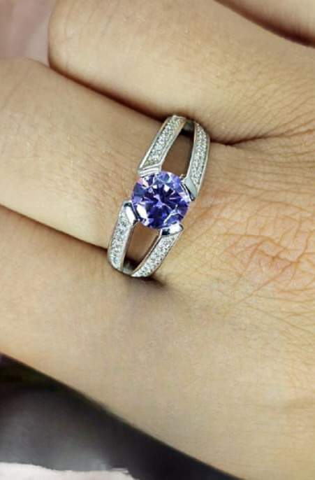 Sterling silver V shape ring with purple cubic zirconia