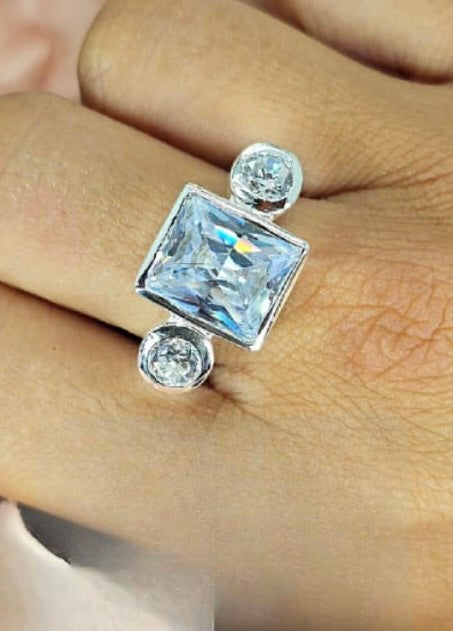 Sterling Silver Ring With Large Square Cubic Zirconia As Well As Two Round Ones