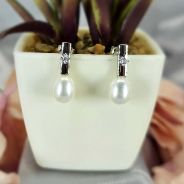 Modern looking sterling silver drops with cubic zirconia stone