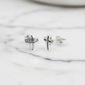 Open cross stud earrings