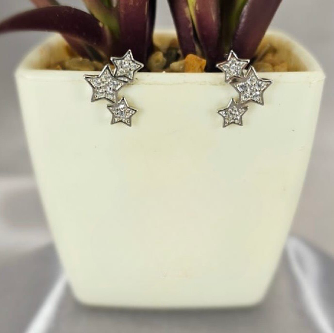 Three shining star studs