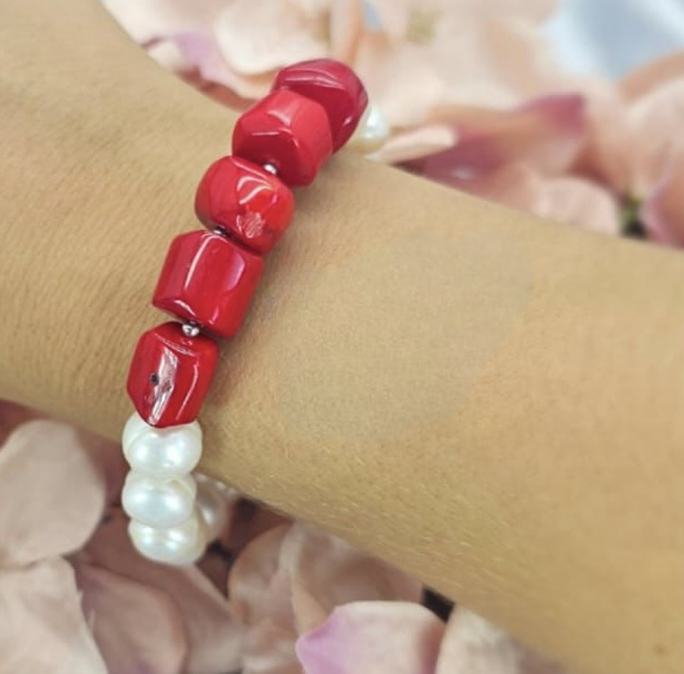 Coral semi presious stone and freshwater pearl bracelet on elastic band