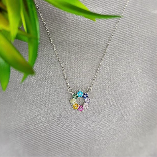Sterling silver necklace with pretty flower detailed coloured centre