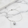 Light grey pearl on bracelet - Terciany 