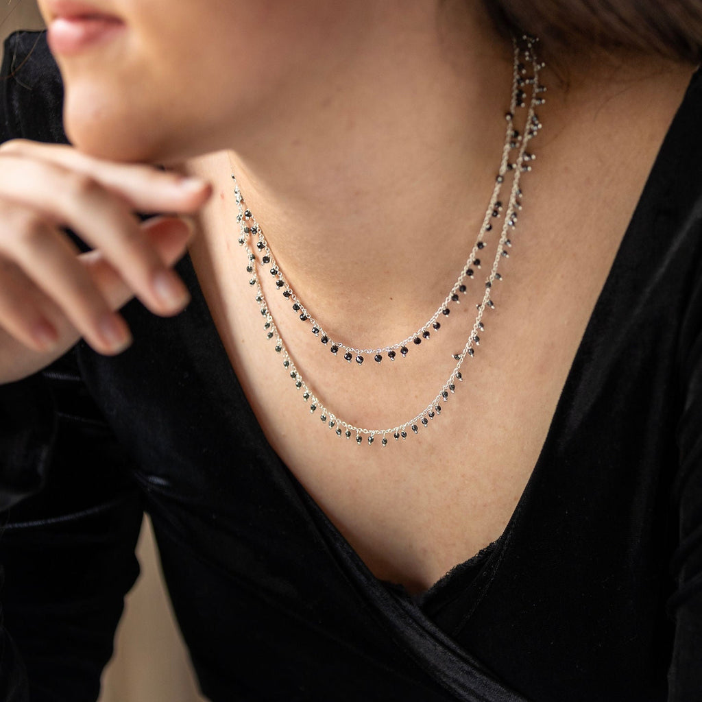 Sterling Silver Necklace With Lots Of Hematite Semi Precious Stones Dangling On It