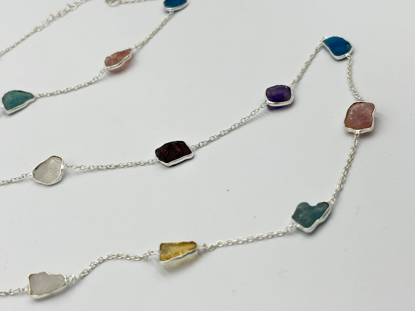 Sterling silver 72cm necklace with lots of Rough Multi coloured semi precious stones
