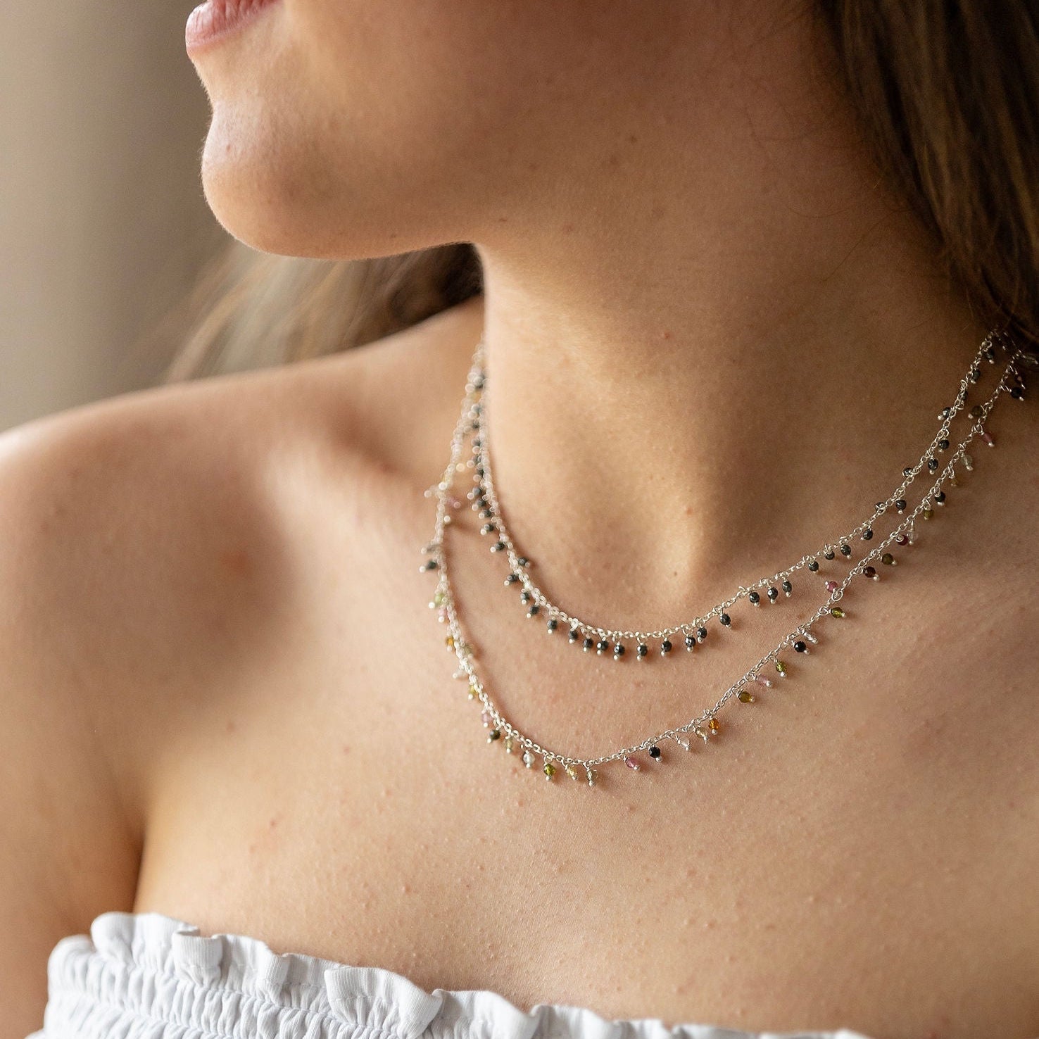 Sterling Silver Necklace With Lots Of Tourmaline Semi Precious Stones Dangling On It