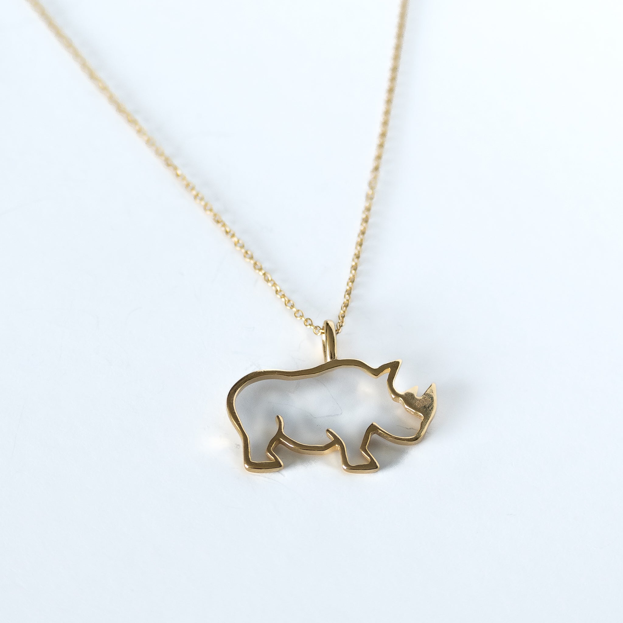 Outlined Rhino In Gold Or Silver