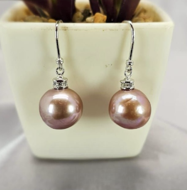 Large awesome pink freshwater pearl earrings with luxury bling top