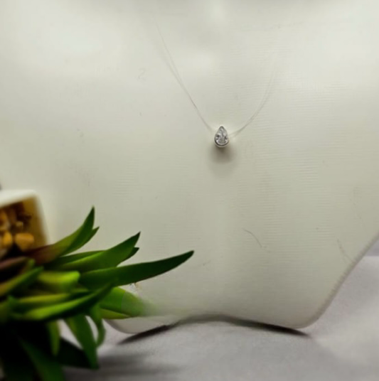 Teardrop cubic zirconia pendant on gut necklace