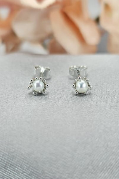 Petite freshwater pearl studs with clasp detail