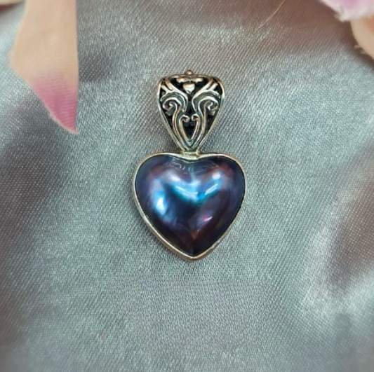 Blue heart shaped Mabe Pearl pendant