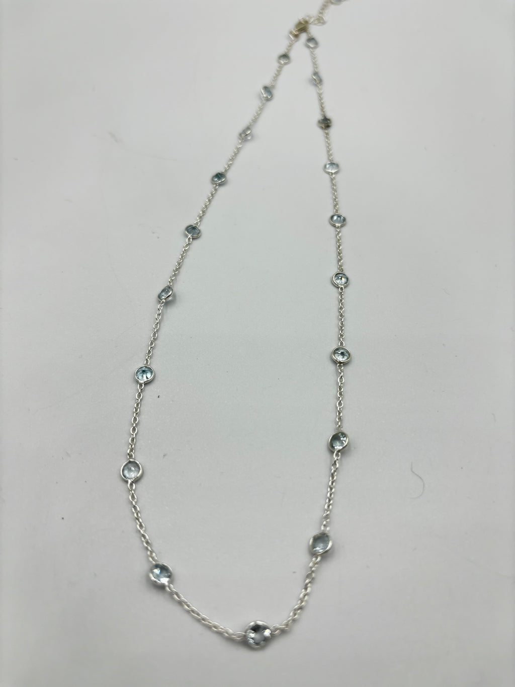 Sterling Silver Necklace With 5Mm Blue Topaz Semi Precious Stones In-Bedded In Necklace