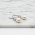 Elegant Freshwater Pearl Drops With Oval Cubic In Tube Earrings