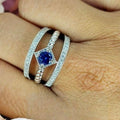 Sterling Silver Three Band Ring With Diamond Shaped Blue Cubic Zirconia