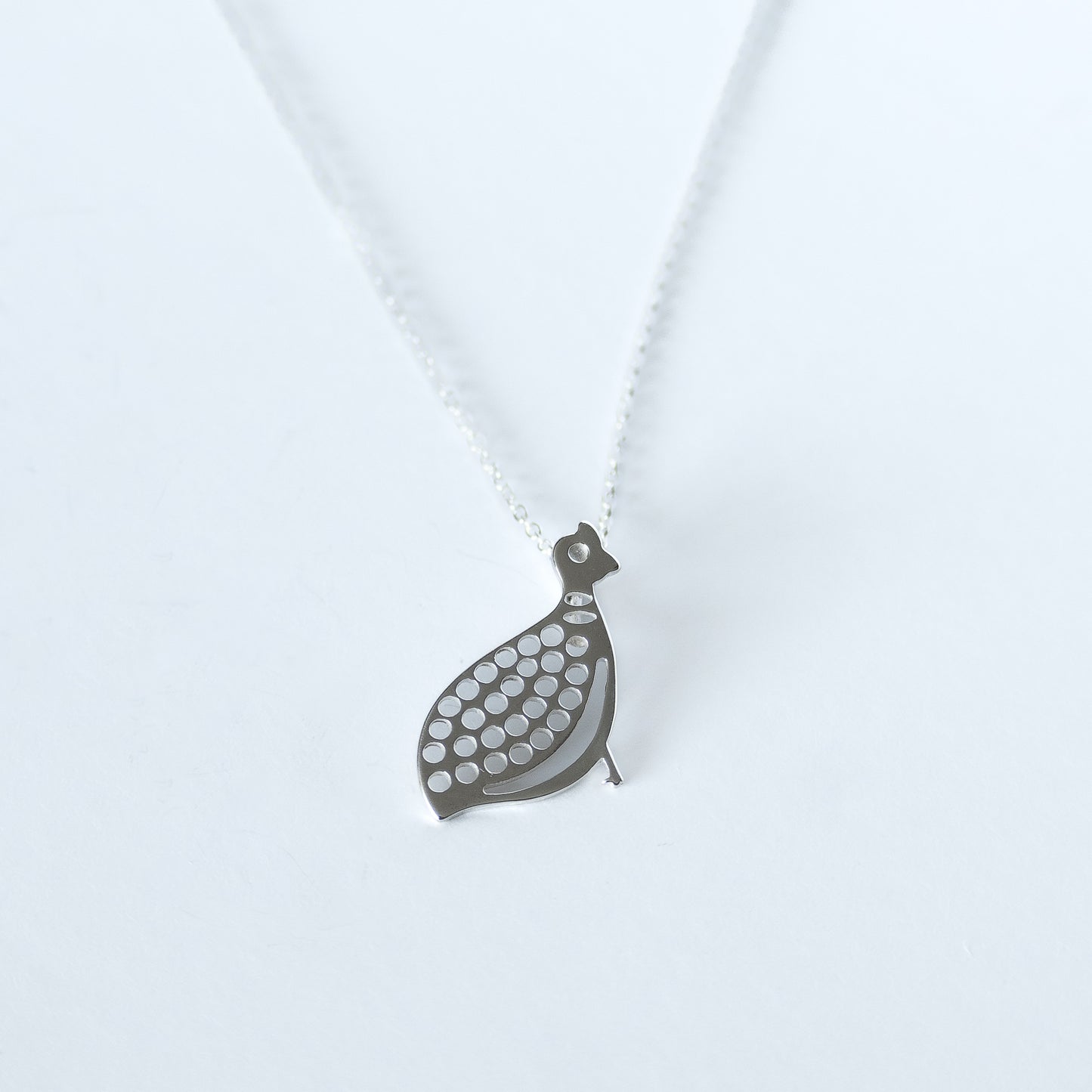 Guinea fowl necklace. Available in sterling silver or gold