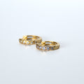 Golden Huggy Earrings With Tube Setting Stones
