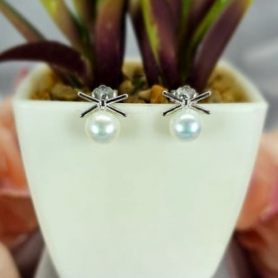 Freshwater Pearl Studs With Bow Tie Top - Terciany 