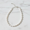 Pearl bracelet with silver dots in between pearls - Terciany 