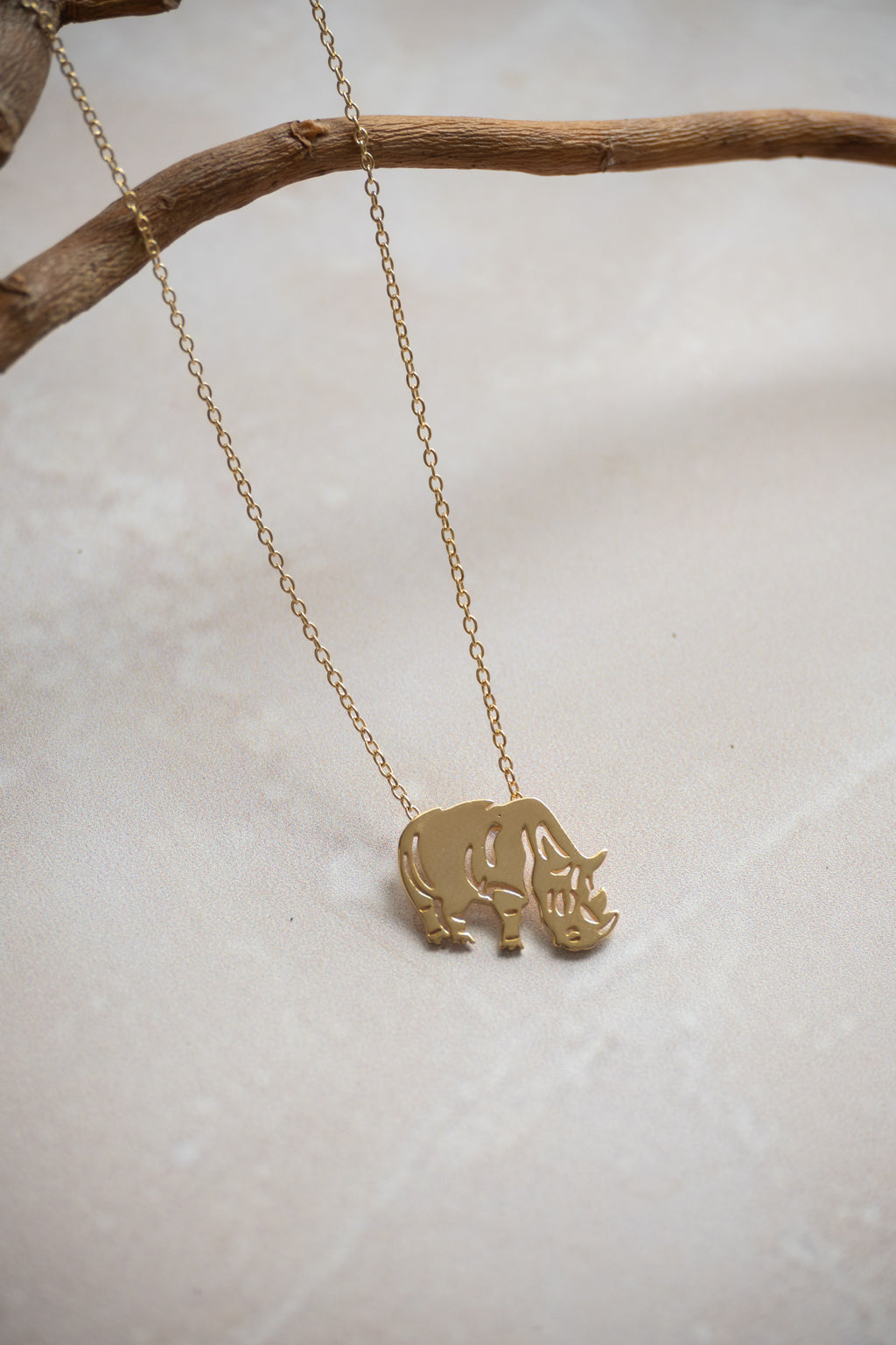 Geo Rhino Neckace In Gold Or Silver