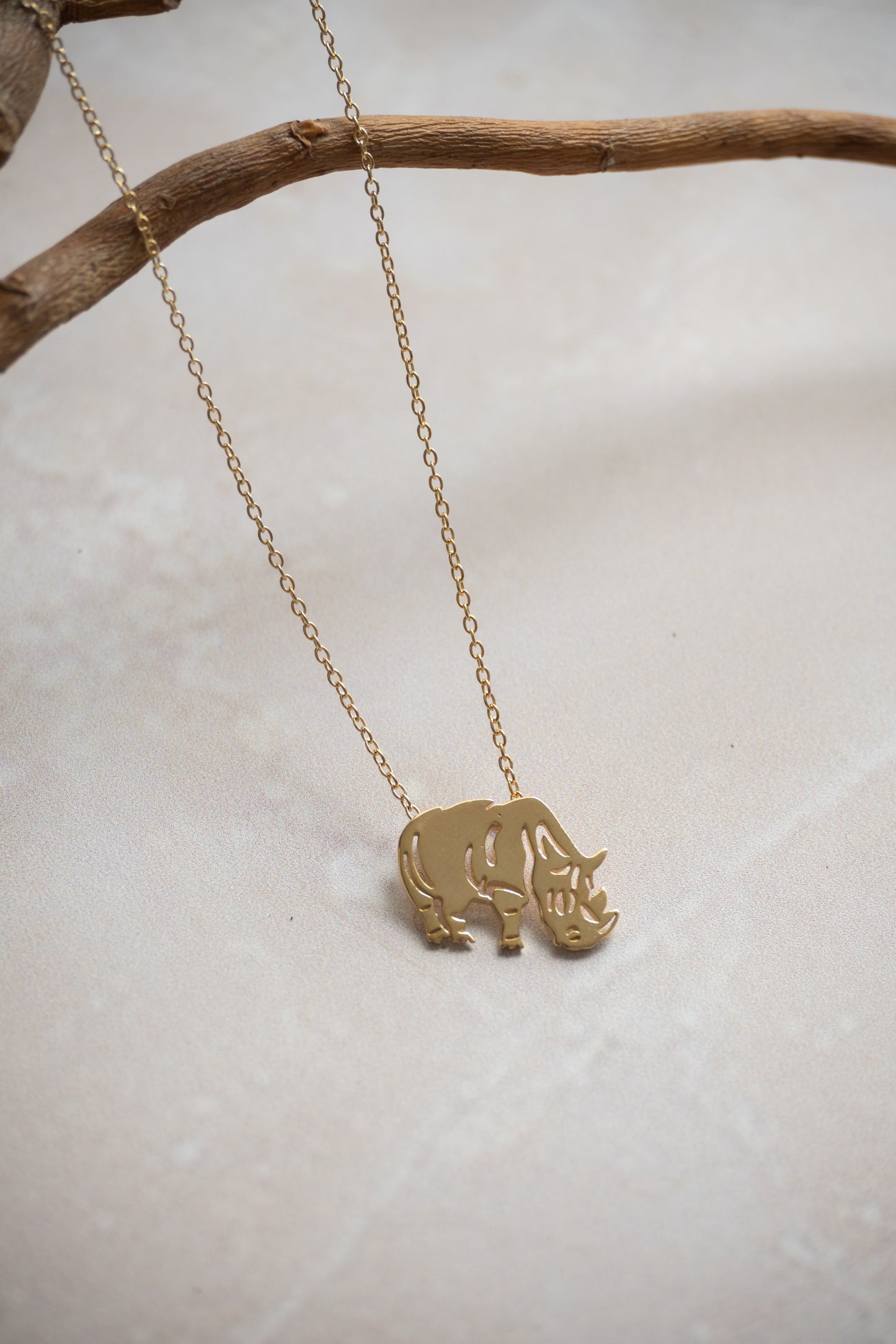 Geo Rhino neckace in gold or silver