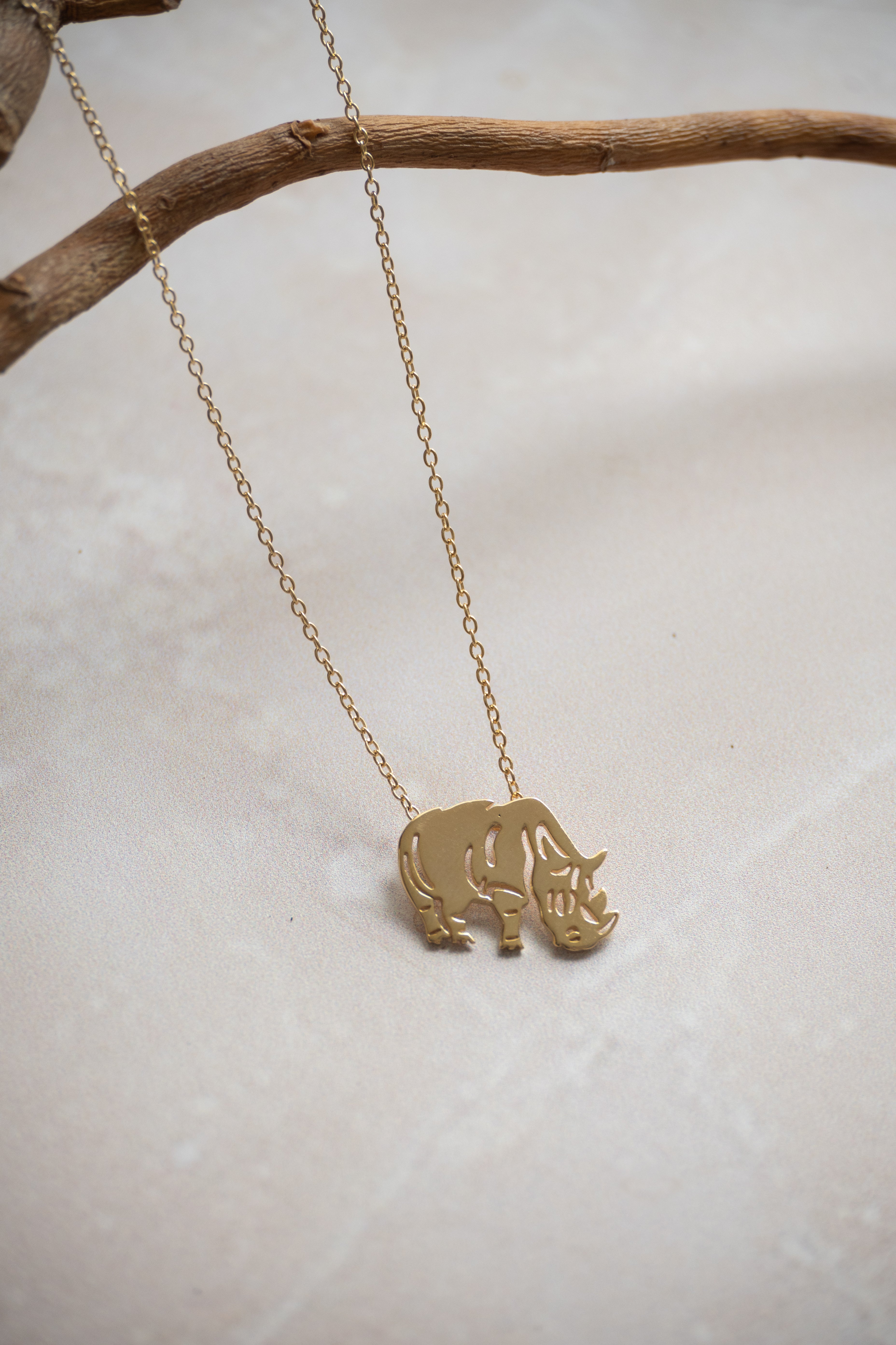 Geo Rhino Neckace In Gold Or Silver