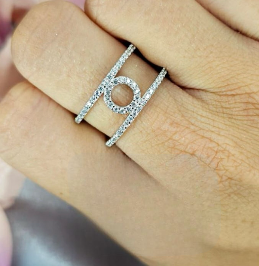 Cubic zirconia pavé ring with two bands and circle in centre