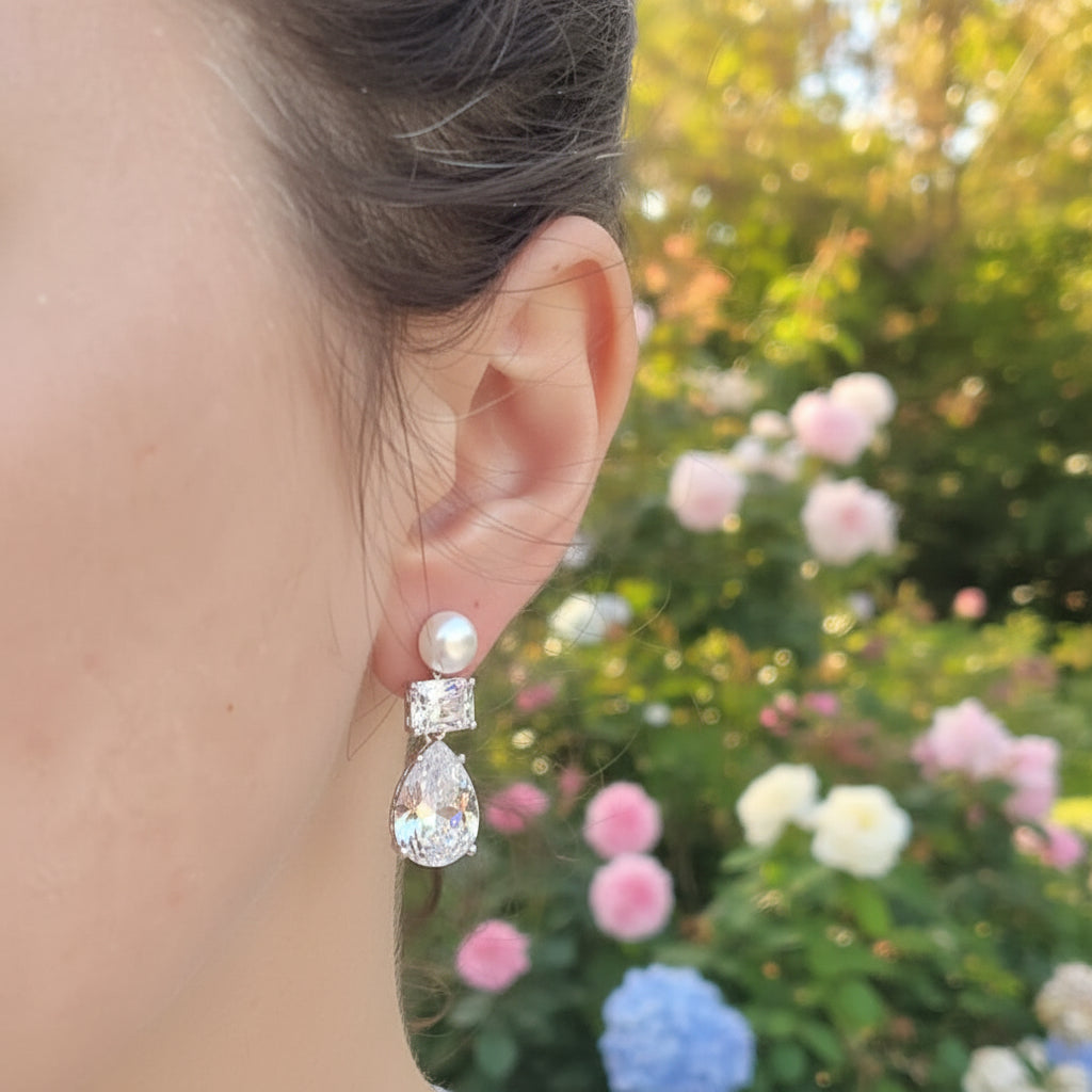 Stunning Eye Catching Drop Earrings With Beautiful Freshwater Pearls And The Brilliant Cut Cubic Zirconia Drops