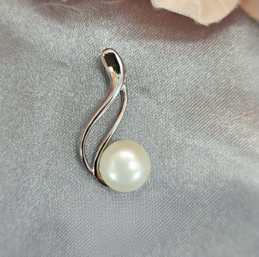 Modern looking sterling silver pendant with freshwater pearl on end