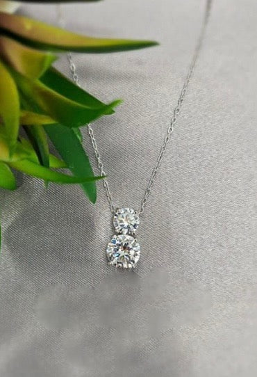 Sterling silver necklace with double bling charm
