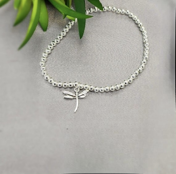 Sterling silver 3 mm ball elastic bracelet with dragonfly