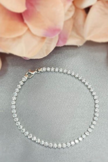 Sterling silver tennis bracelet with solid setting and beautiful cubic zirconia stones