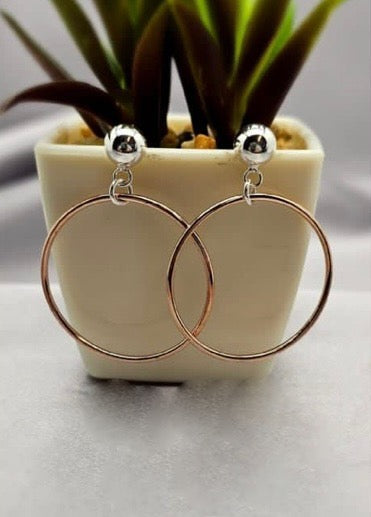 Large rosé gold circle hoop on sterling silver stud