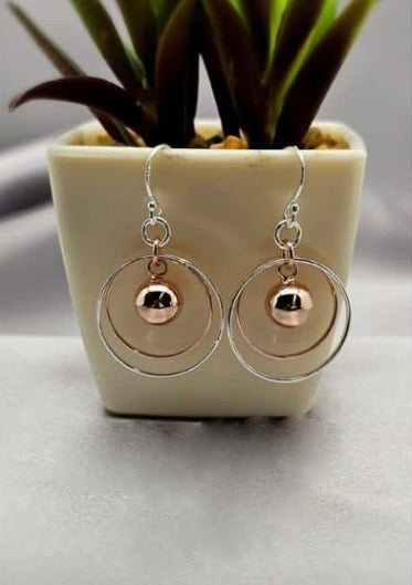 Sterling silver and rose gold plated dangling circles