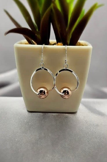 Sterling silver hanging circles with rose gold plated sliding ball