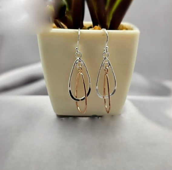 Rose gold and sterling silver dangling ovals